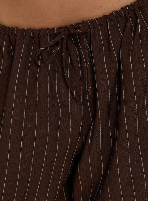 Crafted from premium fabric, the Bungala Oversized Relaxed Pants Brown Pinstripe womens-regular-pants with mid-rise detail Princess Polly