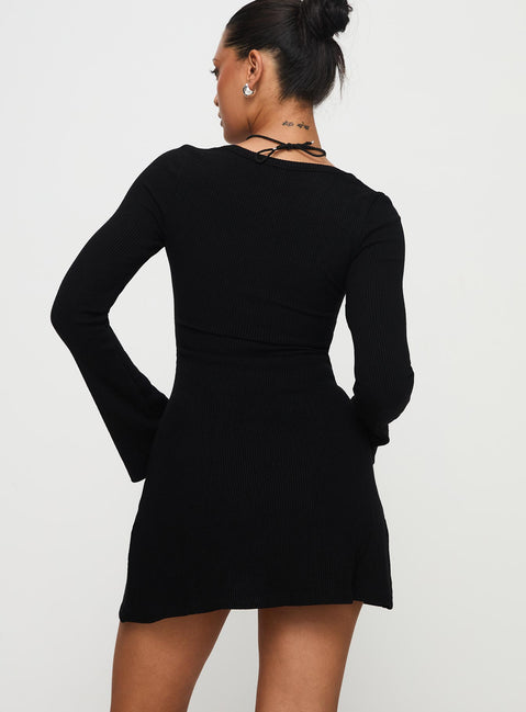 back view of model wearing Princess Polly Best Interest Long Sleeve Mini Dress Black Tall Scoop Neck 