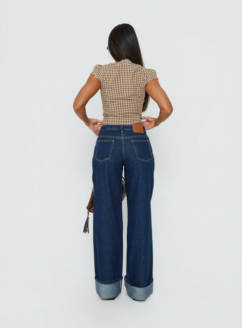 back view of model wearing Princess Polly Darla Low Rise Straight Leg Cuff Jean Dark Blue Wash Low Rise Jeans 