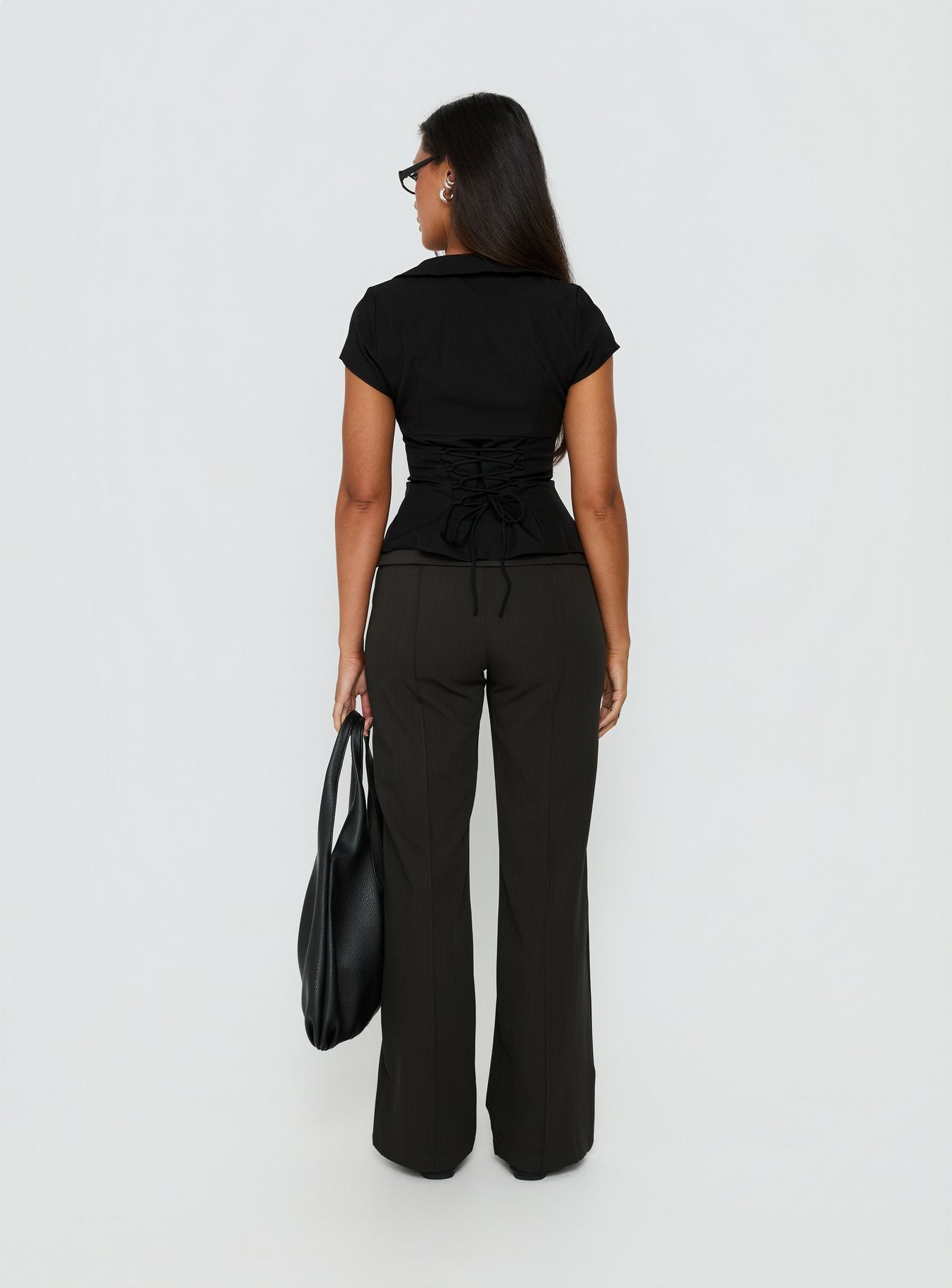 Capturing the Belvia Layered Mid Rise Pants Slate Grey womens-regular-pants with wide-leg silhouette and belt detail back view of model wearing Princess Polly