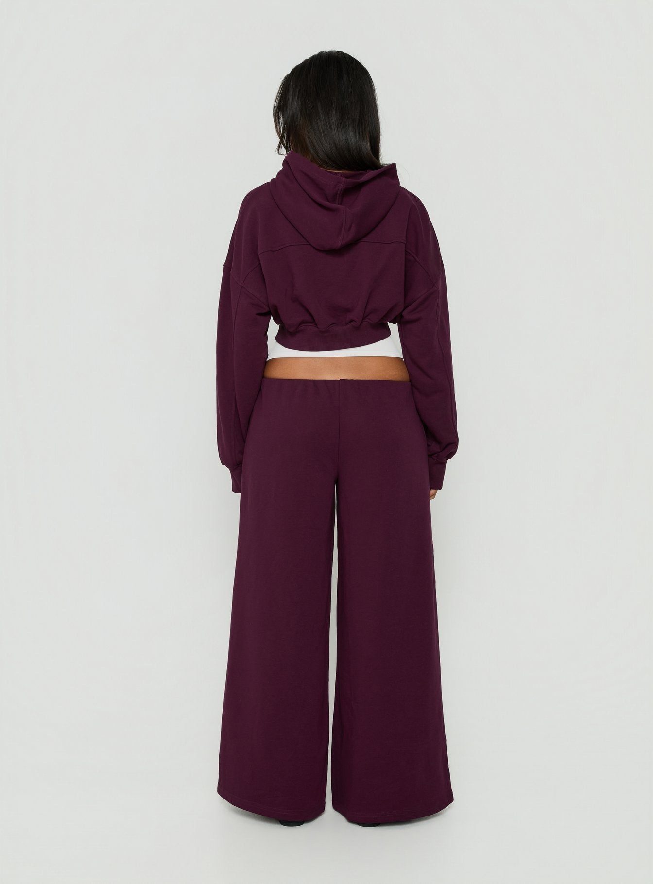 Styled in Kaeya Fleece Wide Leg Low Rise Pants Plum womens-regular-pants back view of model wearing Princess Polly