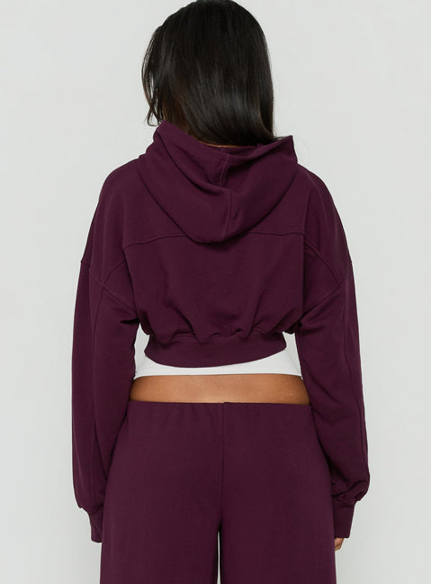 Highlighting the Lanna Fleece Zip Through Cropped Hoodie in Plum, a short womens jumper with oversized fit and hood detail, back view of model wearing Princess Polly