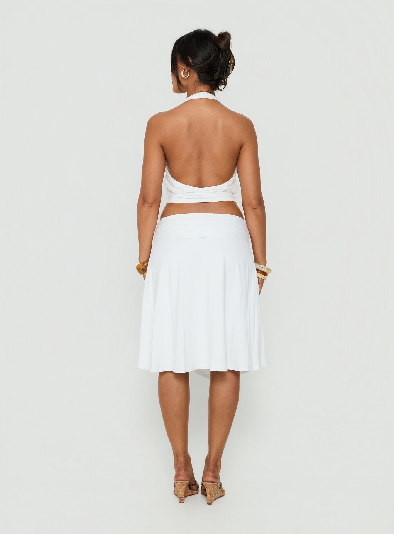 Presenting the Soft Focus Tie Waist Midi Skirt White womens-skirts in midi length with wrap details back view of model wearing