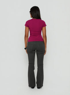 Styled in a low rise design, the Trust Fund Bootleg Cargo Pants Charcoal in womens regular pants, back view of model wearing Princess Polly