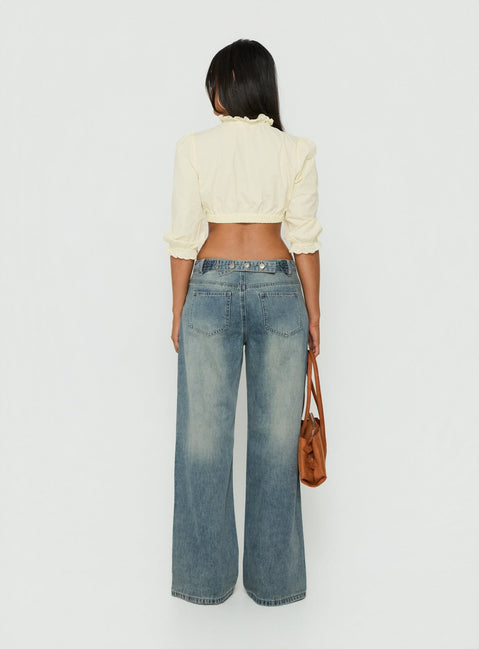 Designed with Karlos Low Rise Cinched Baggy Jeans Vintage Mid Blue Wash womens-jeans in low-rise back view of model wearing Princess Polly