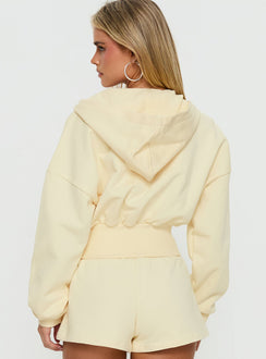 back view of model wearing Princess Polly Daytime Cropped Blouson Hoodie Buttercream Cropped Jumpers 