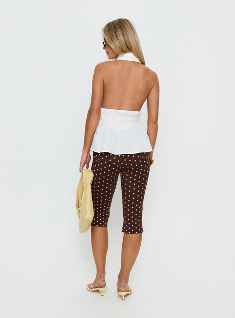 back view of model wearing Princess Polly Samaira Capri Pant Brown Polka Dot Mid Rise Pants Pants 