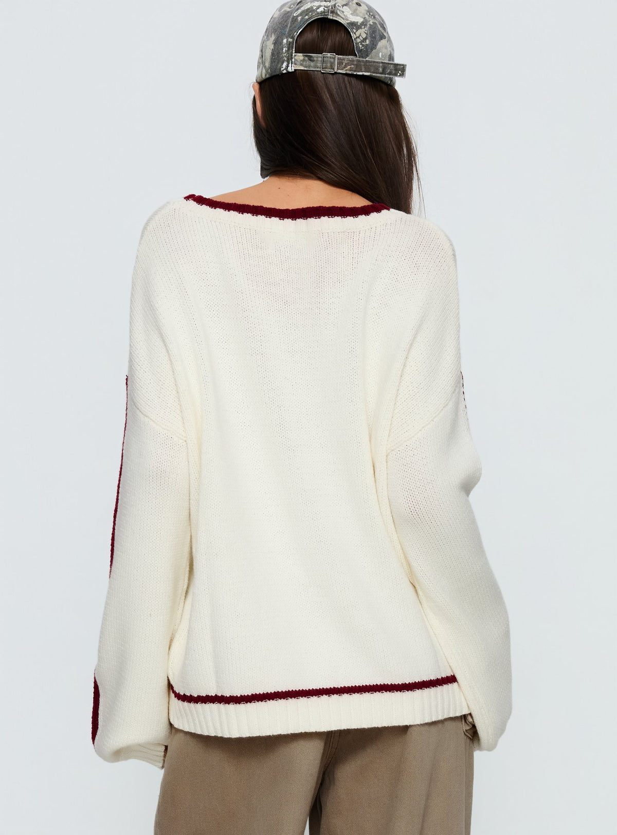 back view of model wearing Princess Polly Star Track Graphic Jumper Cream / Red Longline Jumpers 