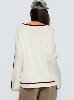 back view of model wearing Princess Polly Star Track Graphic Jumper Cream / Red Longline Jumpers 