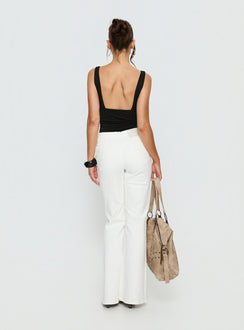 back view of model wearing Princess Polly Magic Mirror Mid Rise Bootleg Jeans Ecru Mid Rise Jeans 