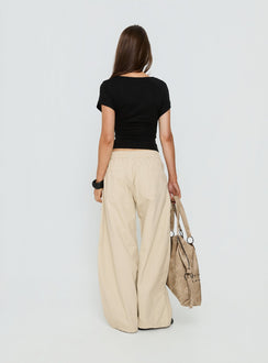 back view of model wearing Princess Polly Selective Memory Low Rise Wide Leg Cargo Pants Cream Low Rise Pants 