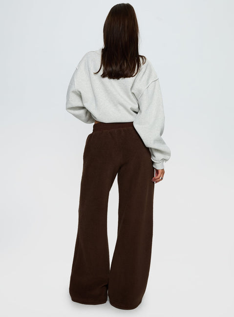 back view of model wearing Princess Polly Siberia Fleece Track Pant Chocolate Brown High Rise Pants 