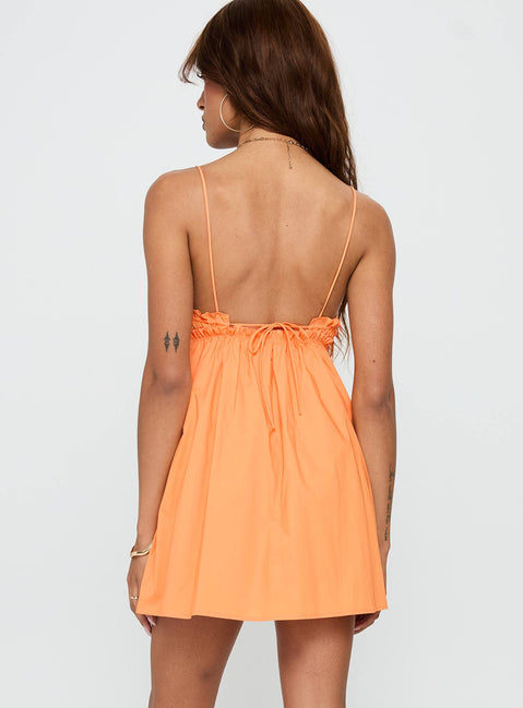 back view of model wearing Princess Polly Alchemy Mini Dress Peach Plunger 