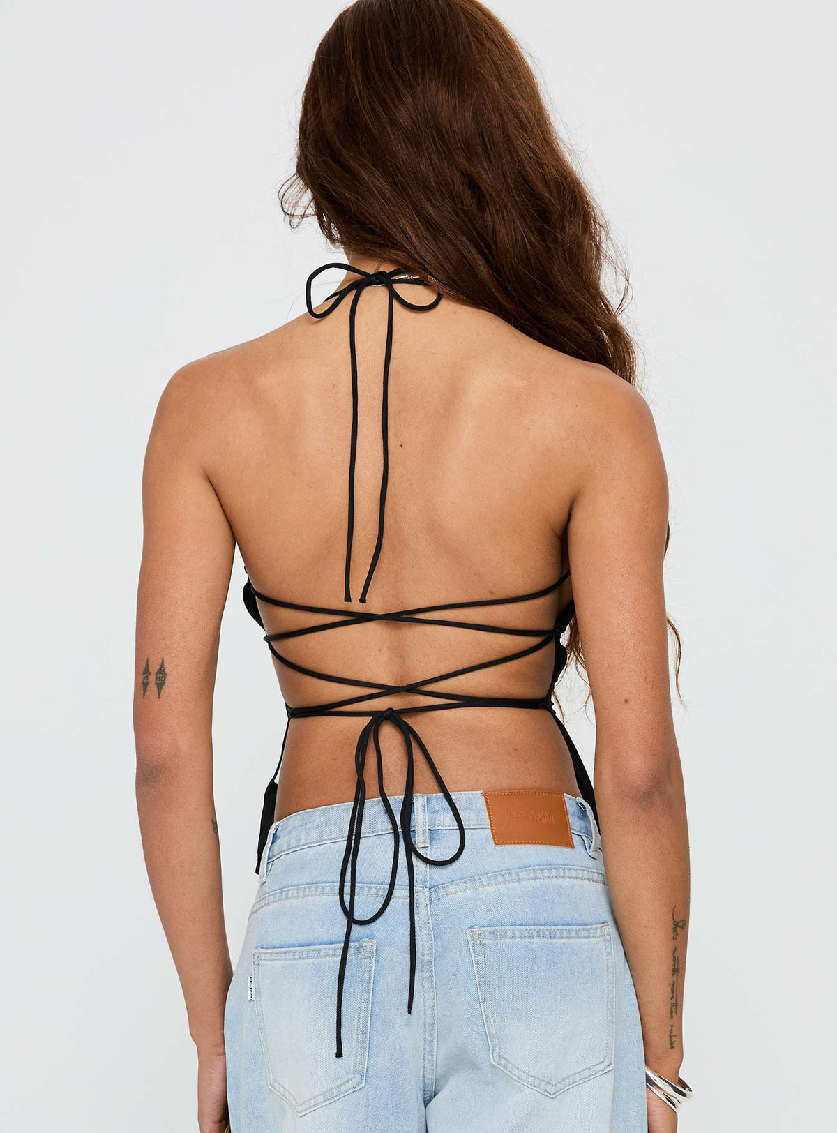 back view of model wearing Princess Polly In The End Tie Back Top Black Sleeveless Square Neck 