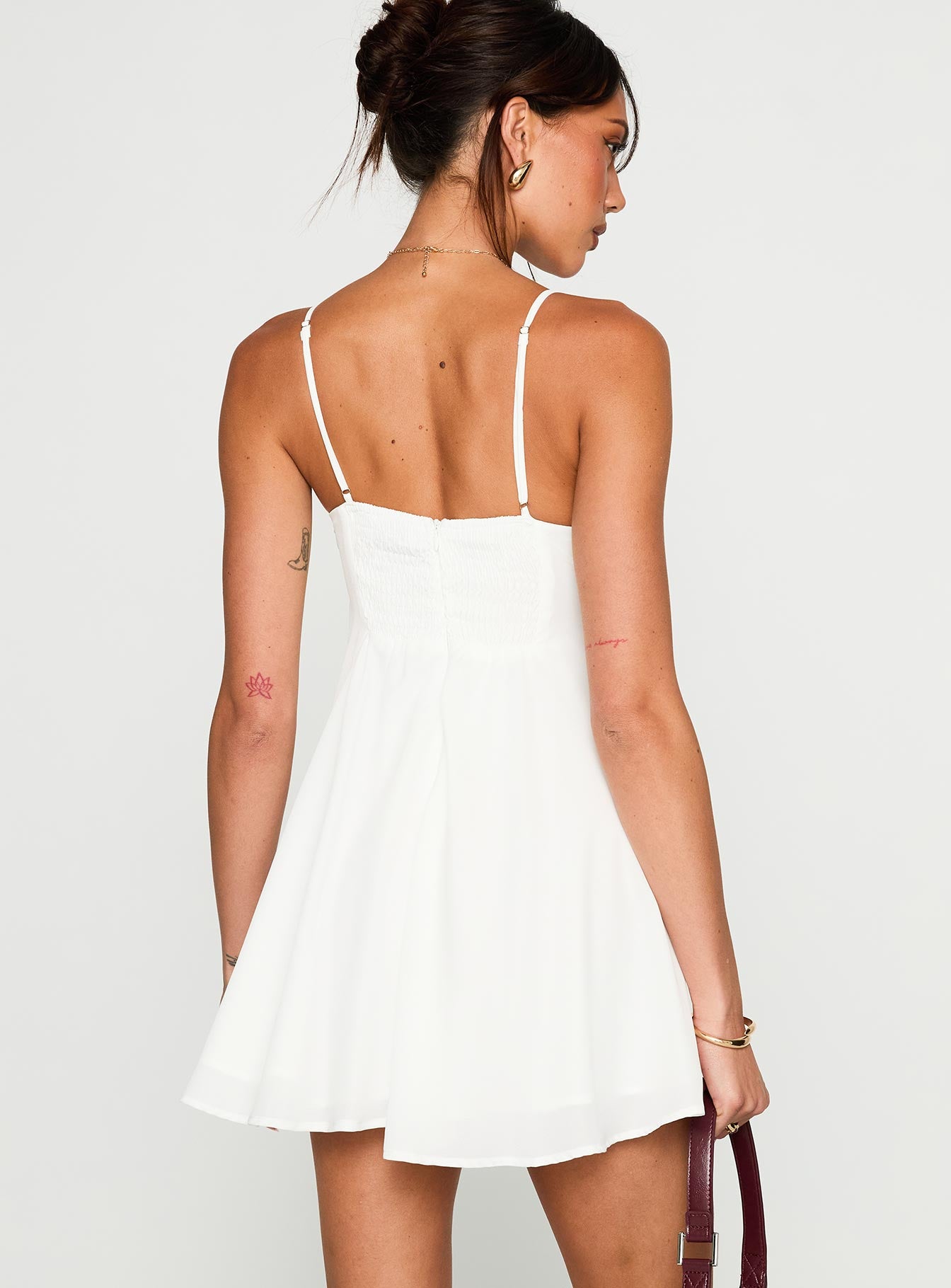 back view of model wearing Princess Polly Moon Quartz Mini Dress White Plunger 