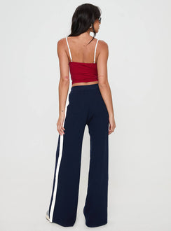 back view of model wearing Princess Polly Albright Pants Navy / Milk Mid Rise 