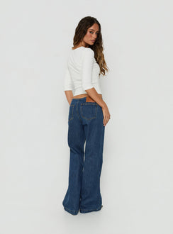 Highlighting the Buenos No Waist Low Rise Straight Leg Jeans Dark Indigo womens-jeans with low-rise back view of model wearing Princess Polly