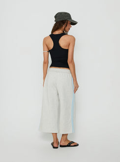 Crafted from Dojo 3/4 Track Pants Grey Marle in womens regular pants featuring mid-rise back view of model wearing Princess Polly