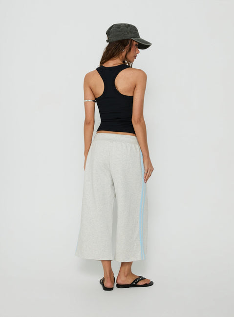 Crafted from Dojo 3/4 Track Pants Grey Marle in womens regular pants featuring mid-rise back view of model wearing Princess Polly