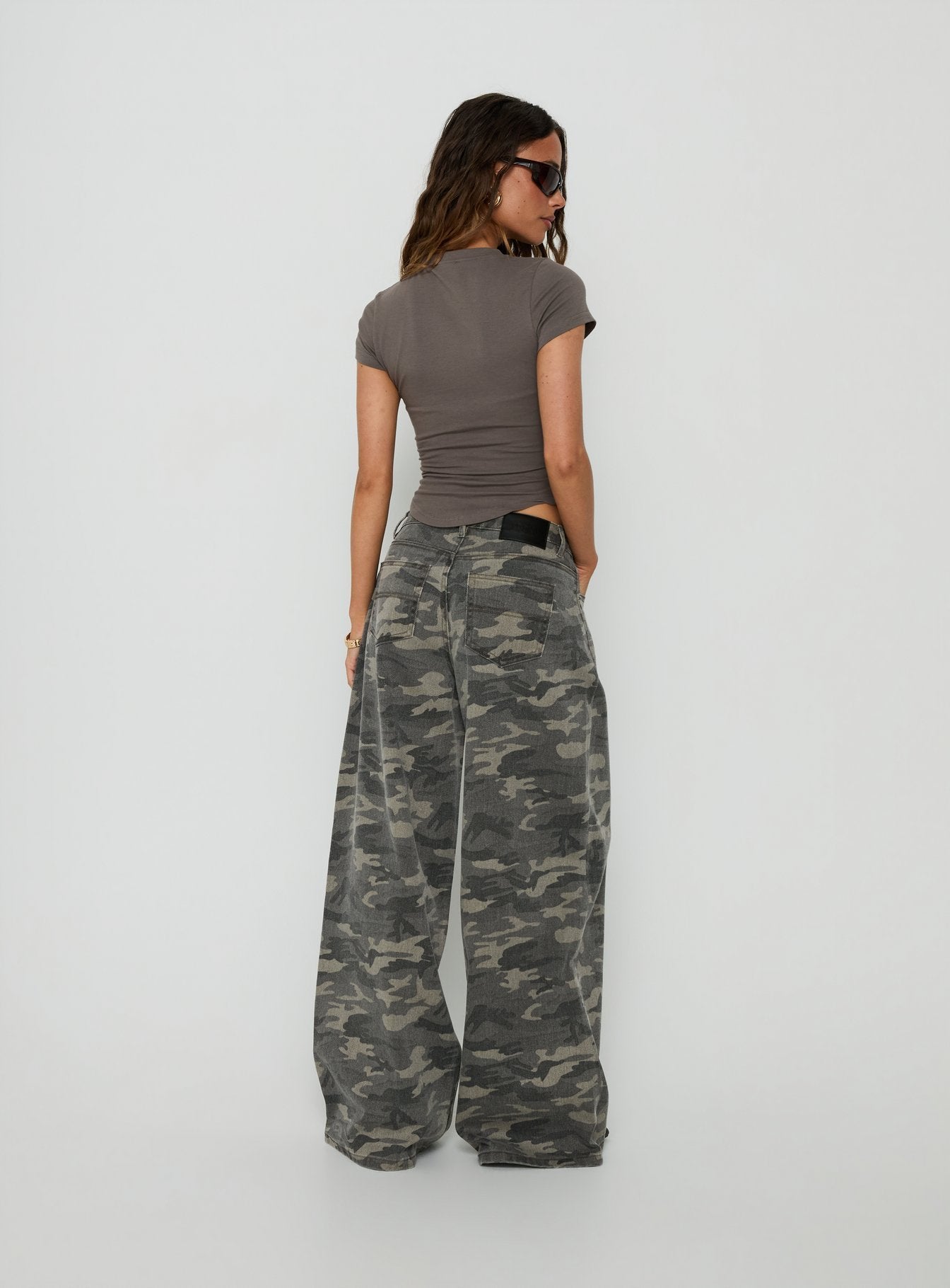 Introducing the Naylor Mid Rise Wide Leg Jeans Camo in womens-jeans featuring belt back view of model wearing Princess Polly