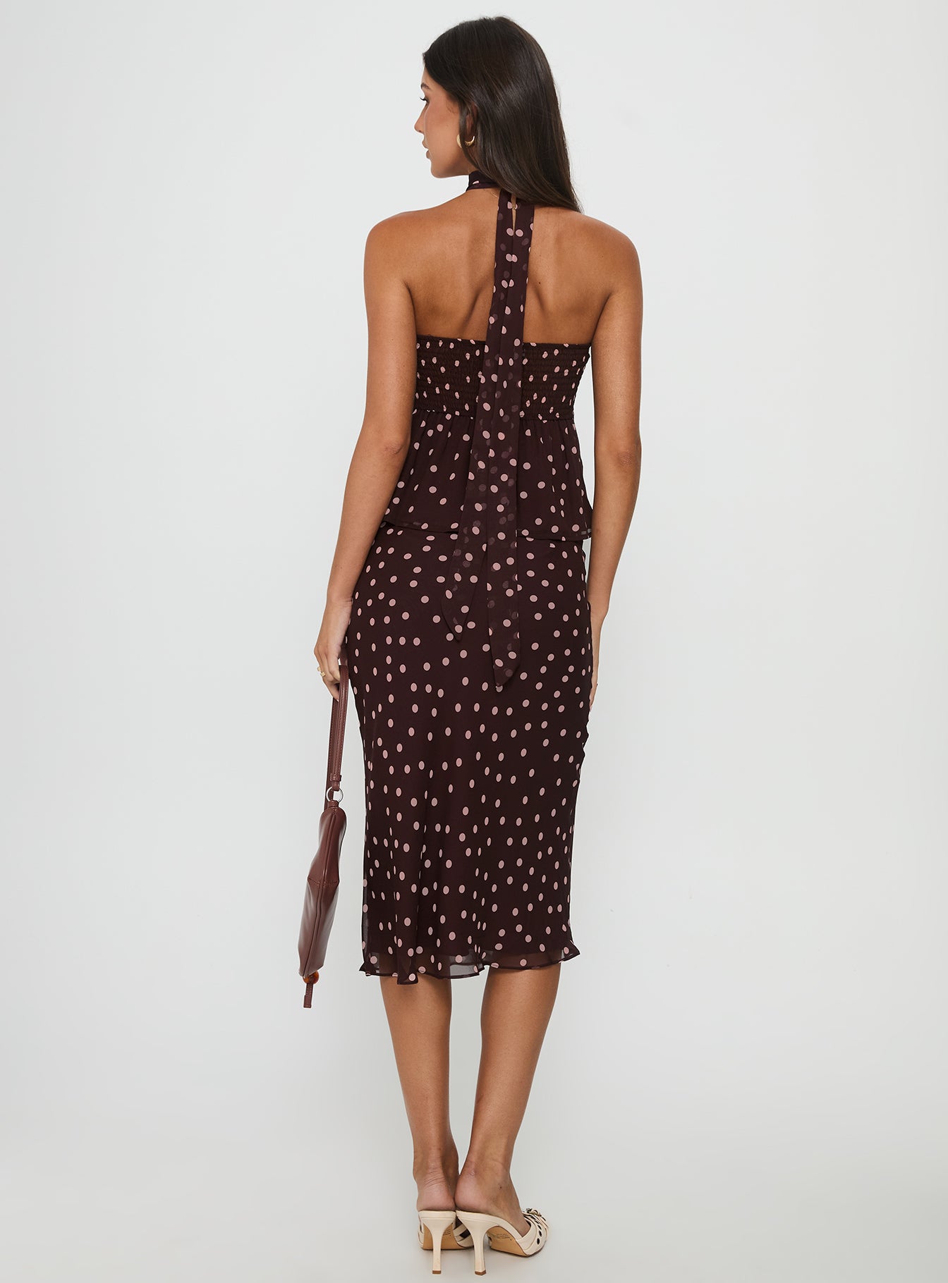 back view of model wearing Princess Polly Sydni Midi Bias Cut Skirt Chocolate / Pink Polka Midi Skirts Skirts 