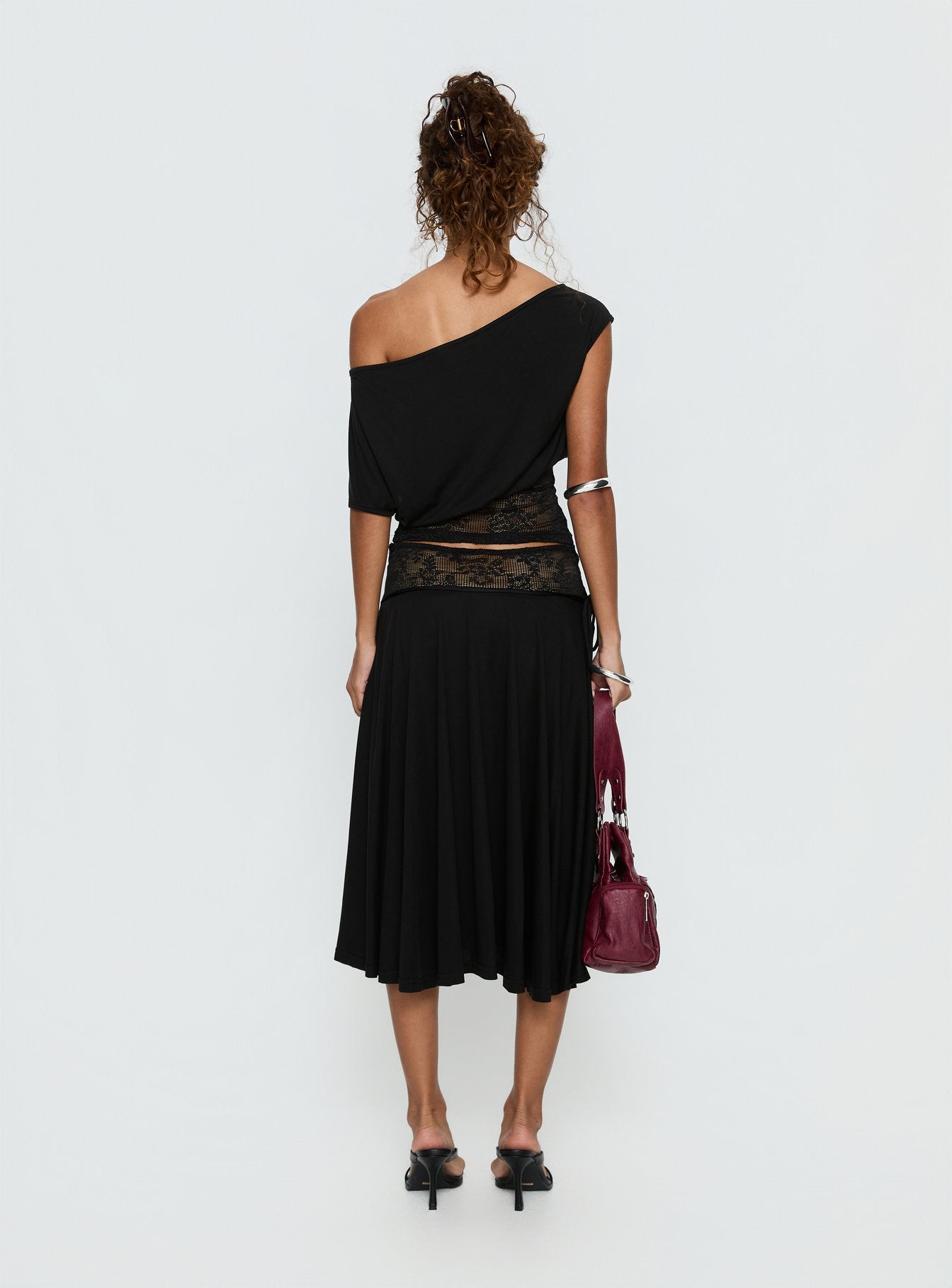 back view of model wearing Princess Polly Marienna Lace Midi Skirt Black Midi Skirts Skirts 