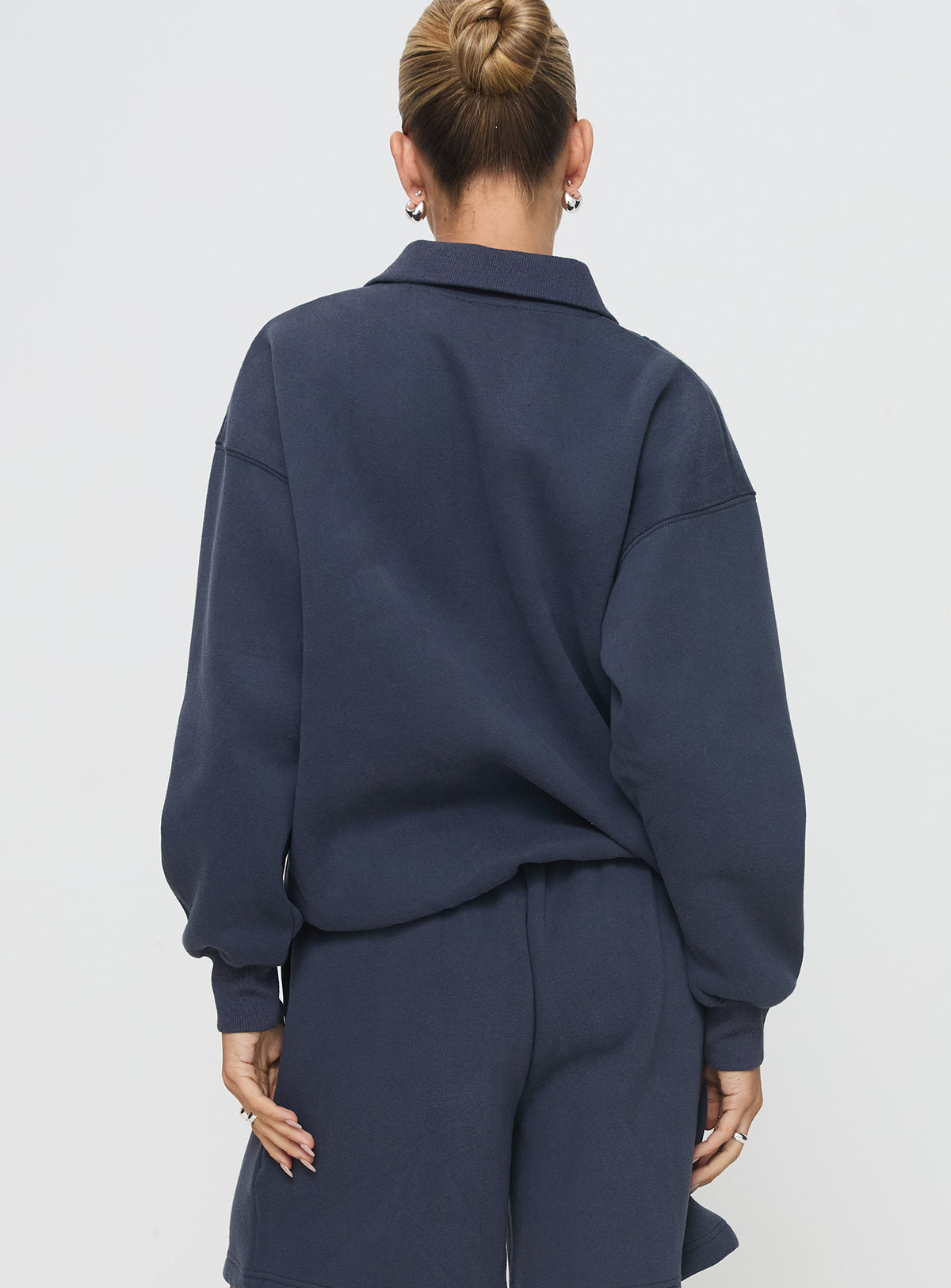 back view of model wearing Princess Polly Dream Fleece Quarter Zip Sweatshirt Navy 