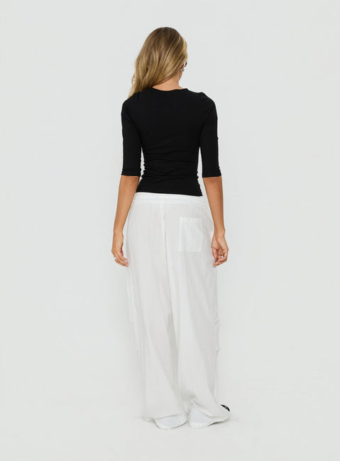 Introducing Mankind Baggy Cargo Pants White in womens-regular-pants with mid-rise, back view of model wearing Princess Polly