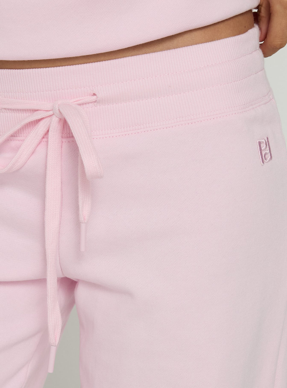 Dodie Wide Leg Pants Pink in womens regular pants with mid-rise waistband detail
