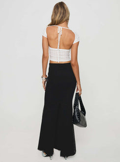 back view of model wearing Princess Polly Topping Maxi Skirt Black Maxi 