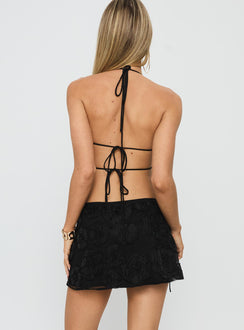 back view of model wearing Princess Polly Wild Card Beaded Tie Mini Skirt Black Mini Skirts Skirts 