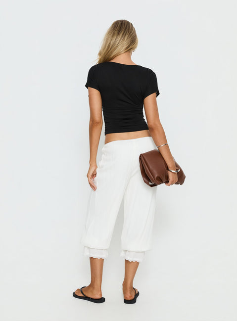 back view of model wearing Princess Polly Basma Bloomer Trouser Pants Rayon White Mid Rise Pants 