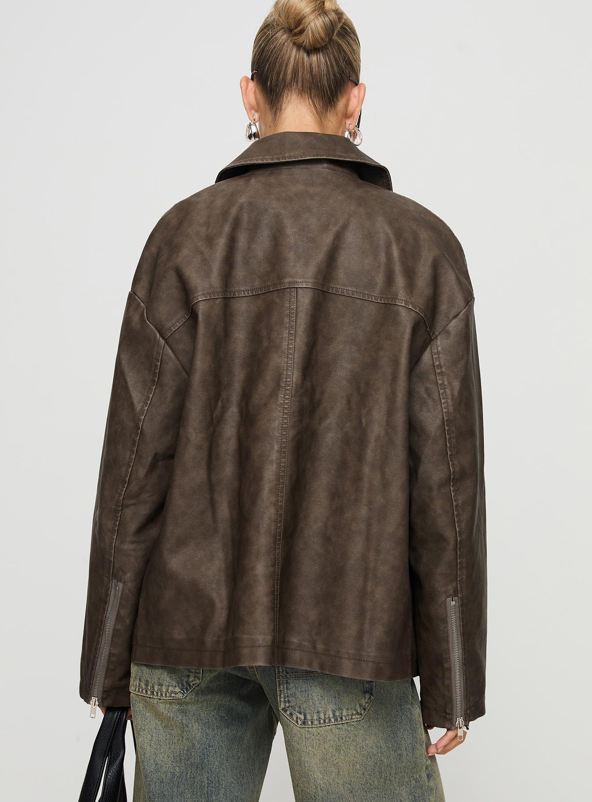 Faux leather jacket Oversized fit, classic collar, drop shoulder, zip fastening, twin hip pockets Good stretch, fully lined 