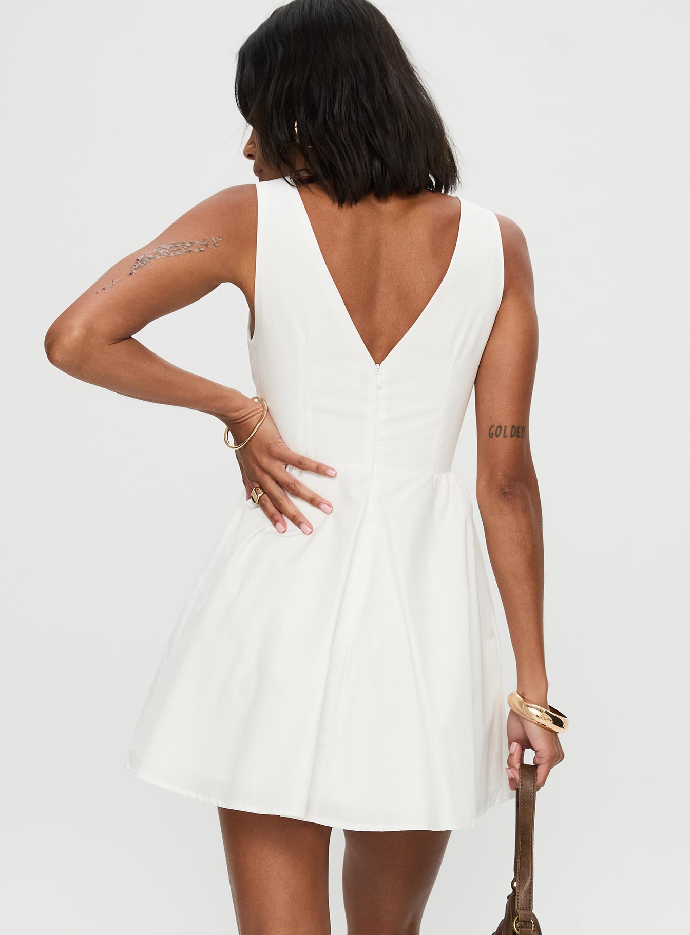 back view of model wearing Princess Polly Maryvonne Mini Dress White High Neck 