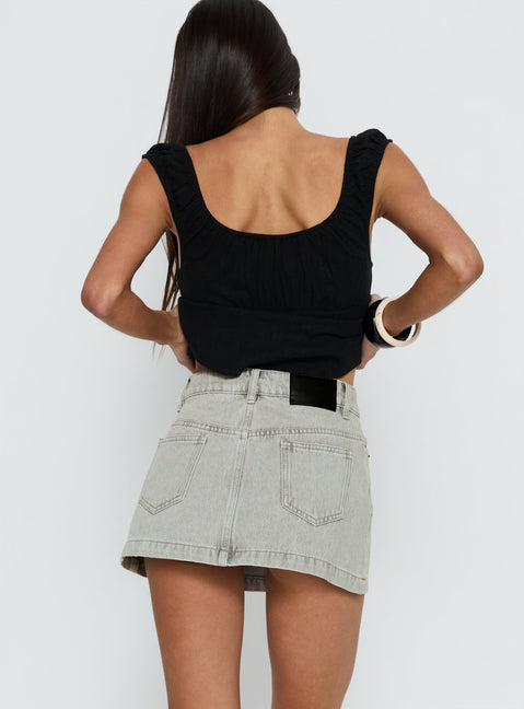 back view of model wearing Princess Polly Nicolina Low Rise Denim Mini Skirt Washed Grey Mini Skirts 