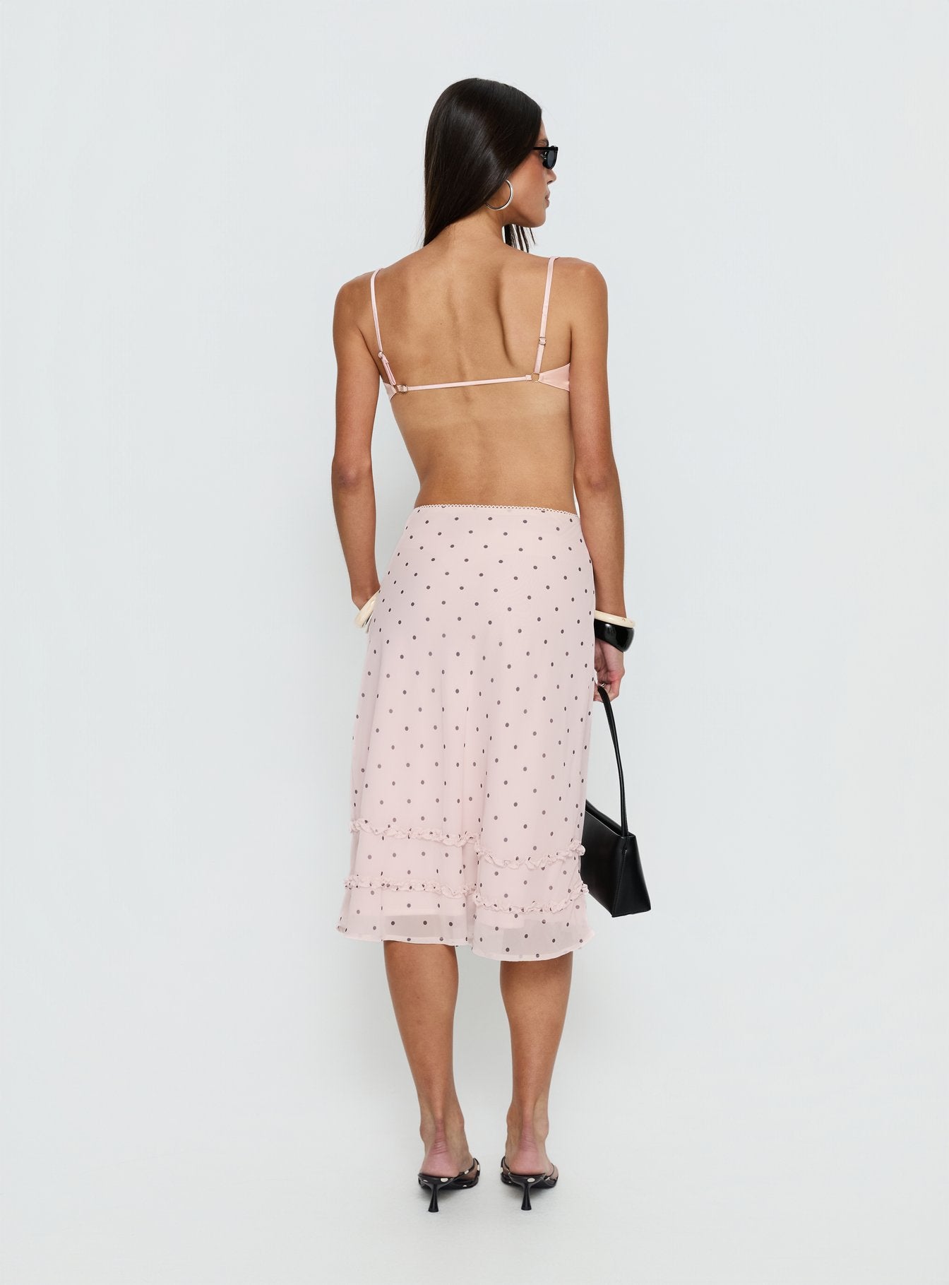 back view of model wearing Princess Polly Clarabella Frill Midi Skirt Pink Polka Dot Midi Skirts 
