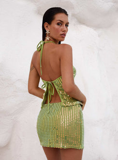 back view of model wearing Princess Polly Zelaia Shimmer Mini Skirt Green Mini Skirts 