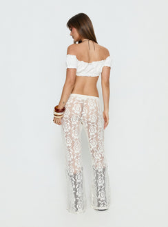 back view of model wearing Princess Polly Rosadonna Lace Flare Pants Cream Mid Rise Pants 