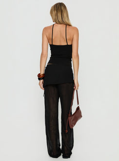 back view of model wearing Princess Polly Margalo Sheer Layered Pants Black Mid Rise Pants 