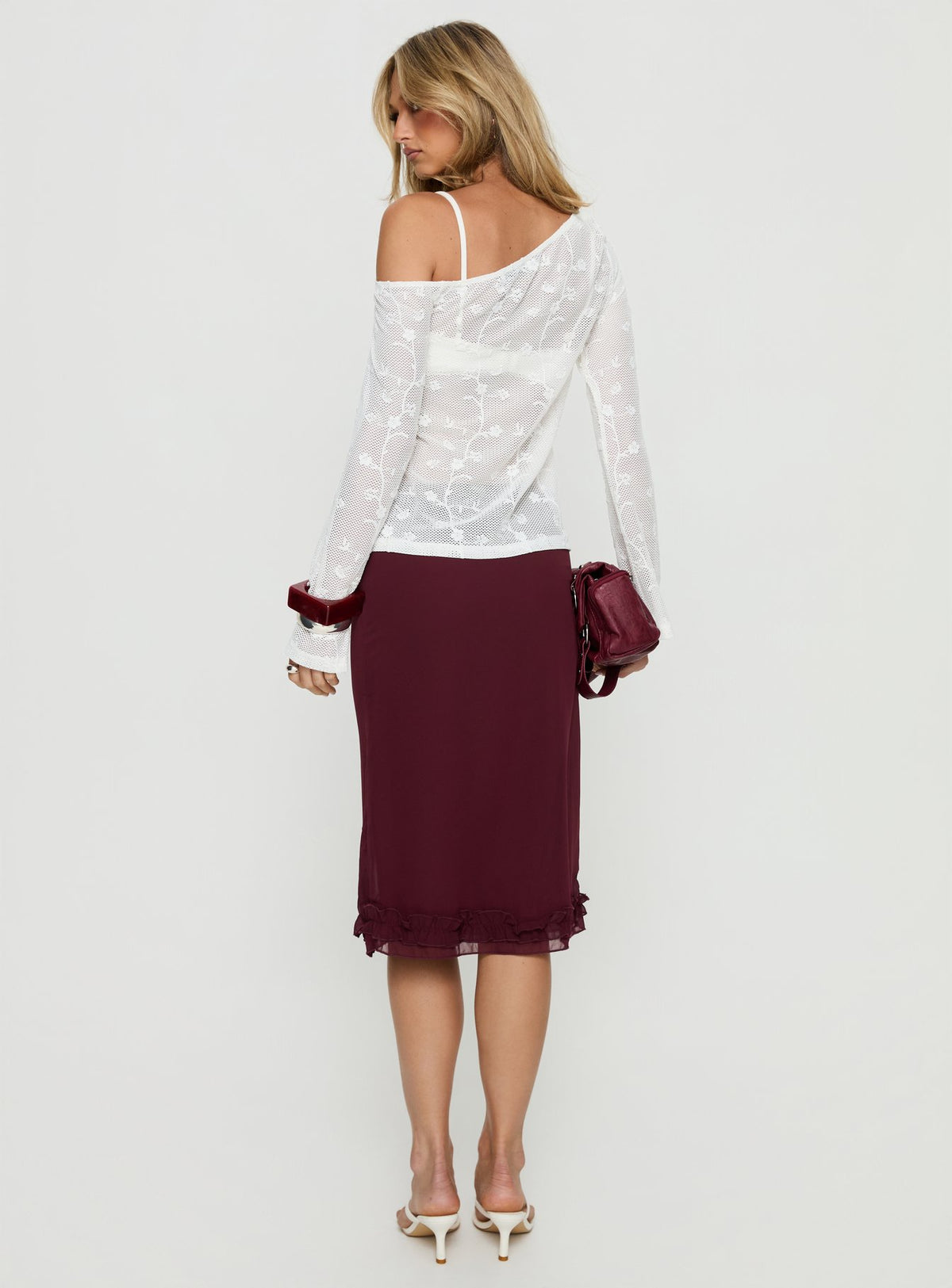 back view of model wearing Princess Polly Rosette Frill Midi Skirt Currant 