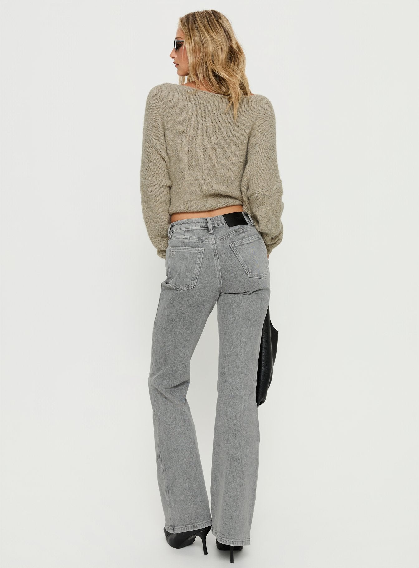 back view of model wearing Princess Polly Magic Mirror Mid Rise Bootleg Jeans Washed Grey Mid Rise Jeans Jeans 