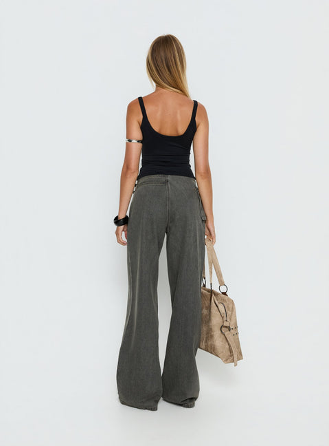 back view of model wearing Princess Polly Paltrow Mid Rise Wide Leg Cargo Jeans Washed Grey Mid Rise Jeans 