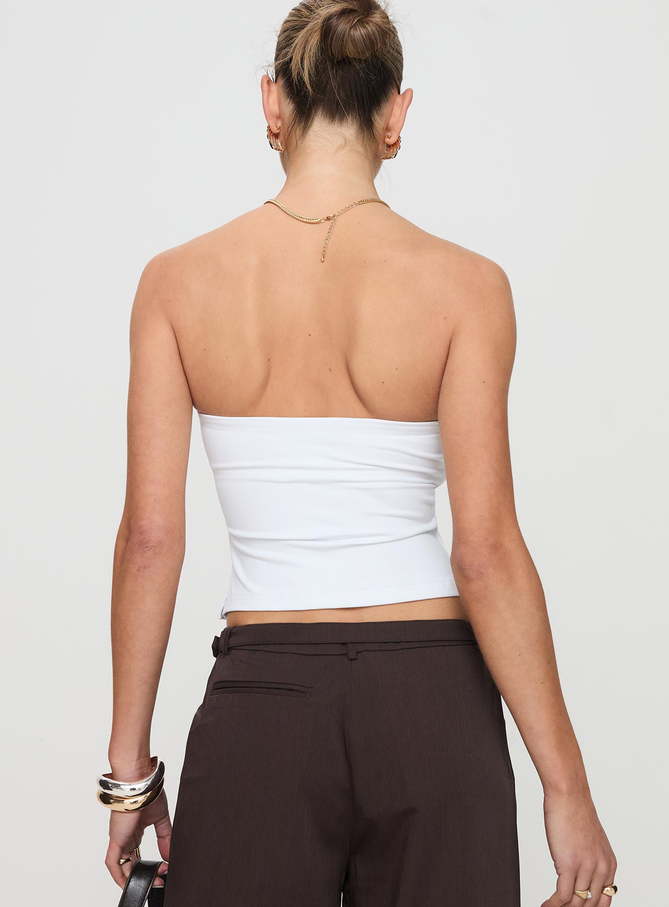 back view of model wearing Princess Polly Aurorah Strapless Top White Sleeveless straight 