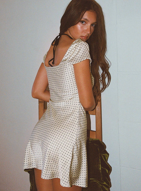 back view of model wearing Princess Polly Lucienna Polka Dot Mini Dress White / Black Scoop Neck 