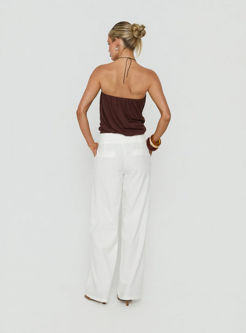 Designed with the Two Lovers Linen Low Rise Pants White in womens regular pants, showcasing wide-leg silhouette and low-rise fit, back view of model wearing