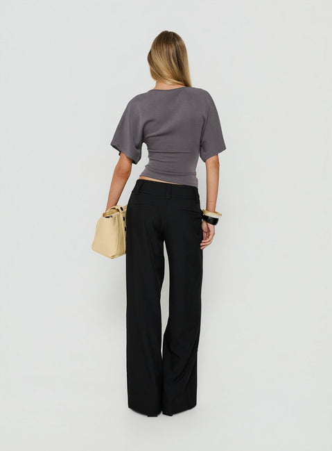 Presenting the Cedars Low Rise Pant Black womens-regular-pants with low-rise back view of model wearing