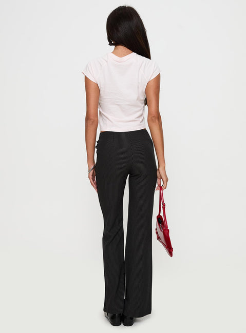 back view of model wearing Princess Polly Sympathiser Pinstripe Pants Black Low Rise Pants 