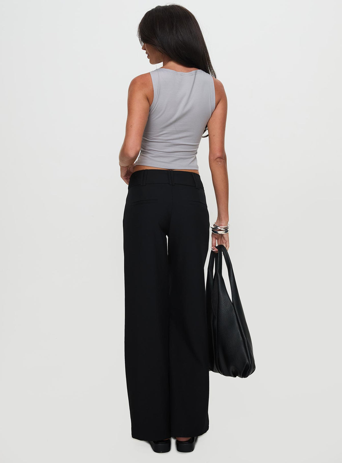 back view of model wearing Princess Polly Two Lovers Low Rise Pants Black Tall Low Rise Pants 