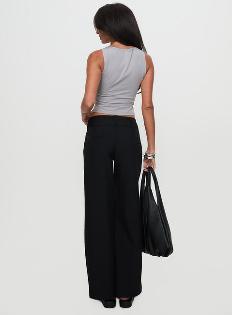back view of model wearing Princess Polly Two Lovers Low Rise Pants Black Tall Low Rise Pants 