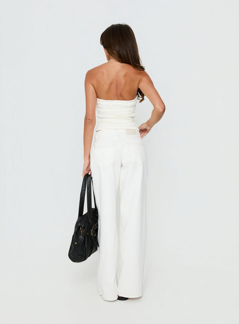 back view of model wearing Princess Polly Supercut Low Rise Baggy Pleat Jeans Cream Mid Rise Jeans Jeans 